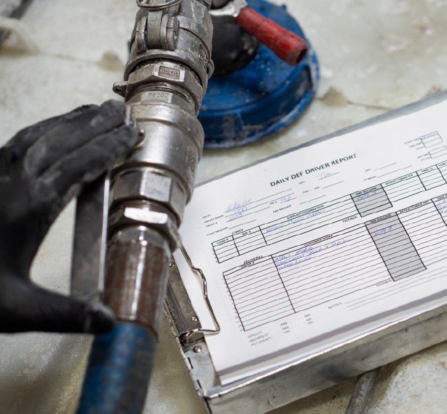 Fuel nozzel near all weather printer paper form.