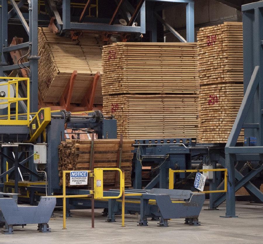 Lumber mill processing timber.