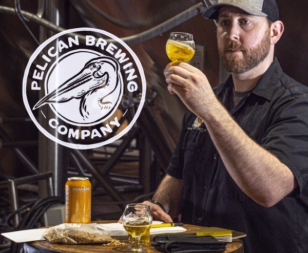 Coren Tradd, Beer developer inspecting a glass of beer.