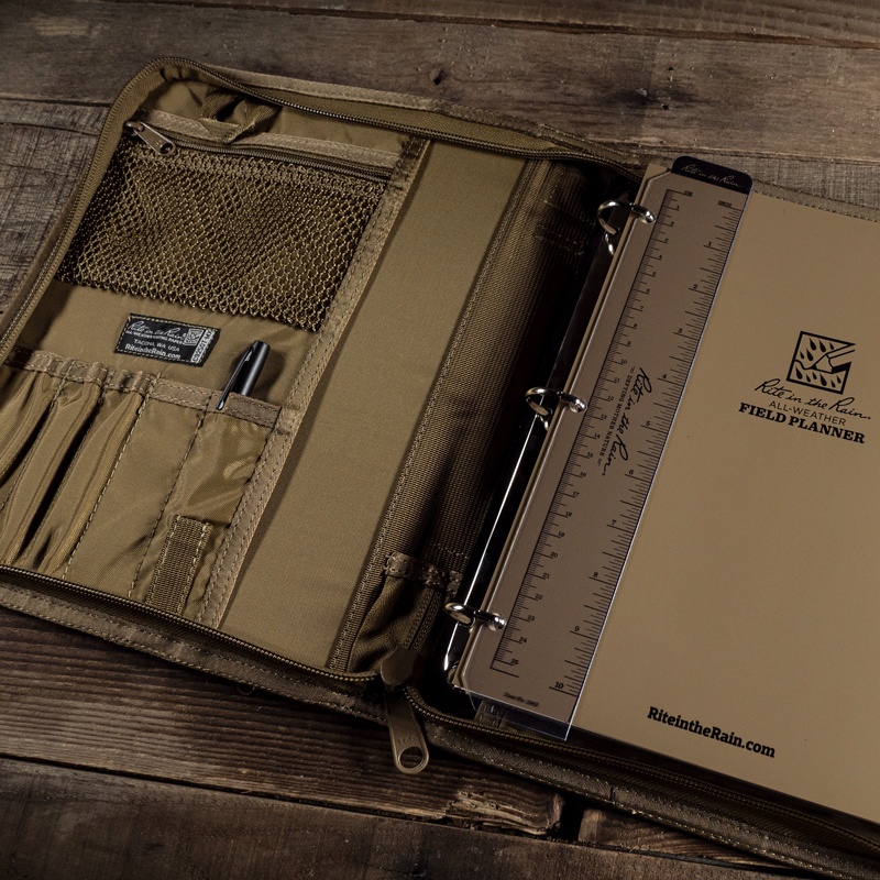 Open planner with writing guard and ruler.