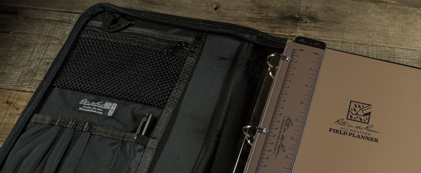 Large open planner kit with all weather pen, ruler, writing guard, and ring binder.