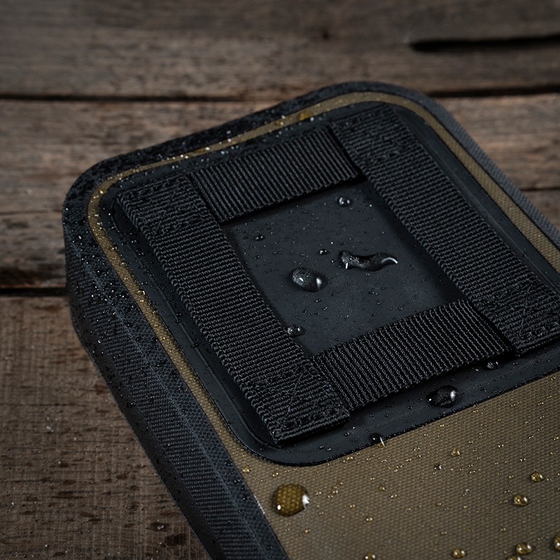 Pocket organizer filled with gear and notebook.