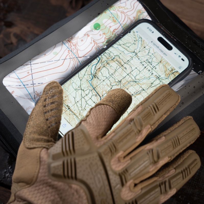 Pocket organizer filled with gear and notebook.